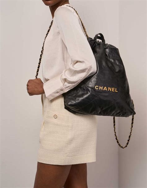 precision chanel backpack black with sequins|Chanel 22 backpack.